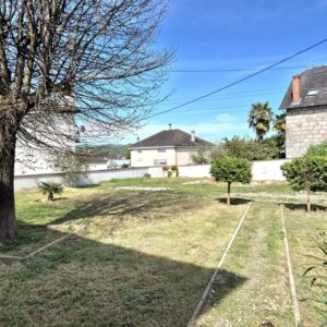 Malemort, proche commerces, terrain plat de 400 m2